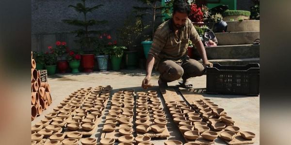 Kashmiri Muslim potter makes 16,000 diyas this Diwali